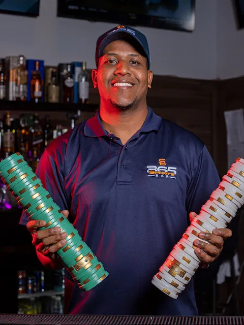 All Sports 365 Sports Book staff with casino chips